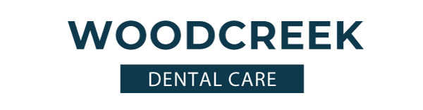 Woodcreek Dental Care & Orthodontics Logo